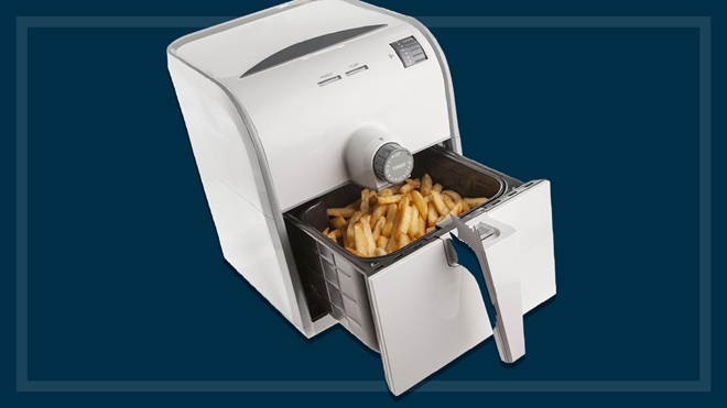 air fryer with chips navy background